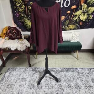 Burgundy blouse with lace sleeves